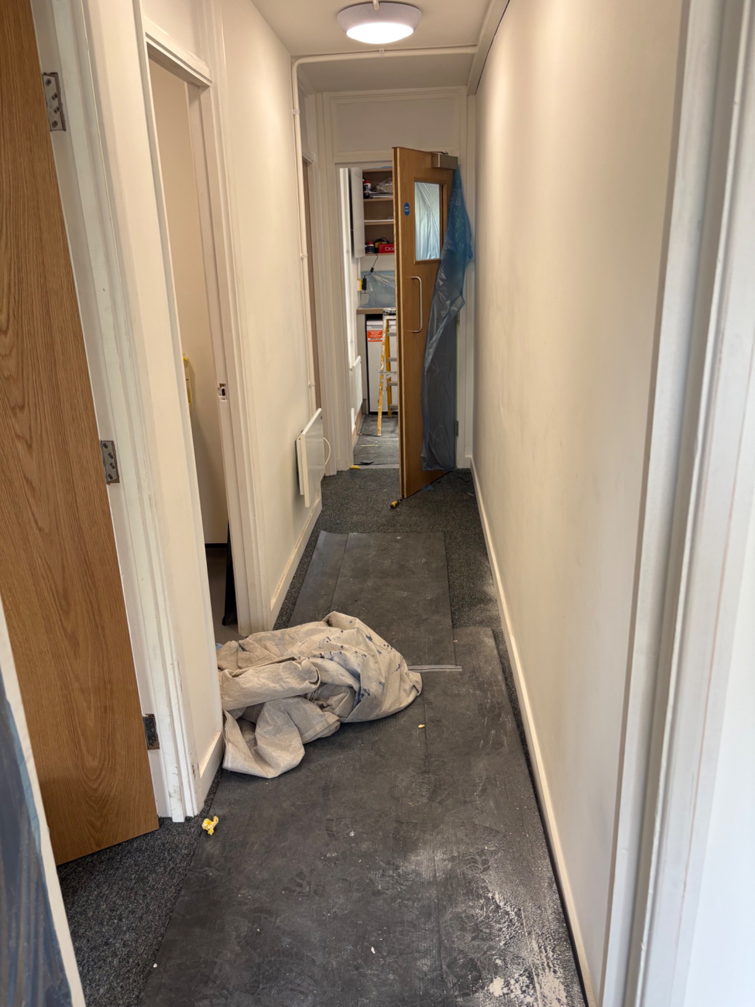 Before — corridor during building works