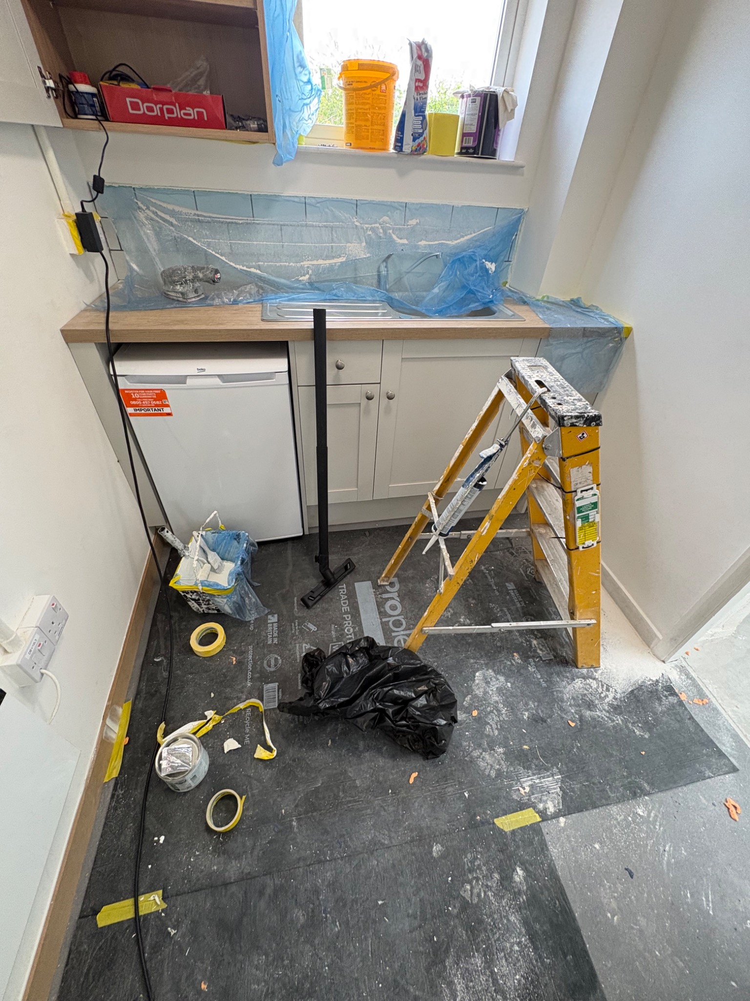 Before — kitchen area during building works