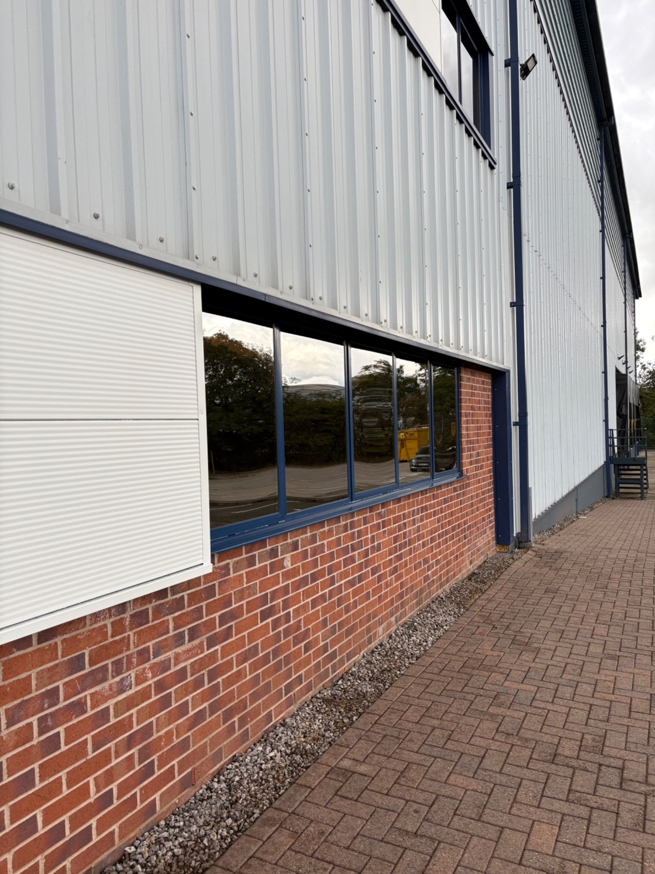 Exterior cladding, windows and brickwork